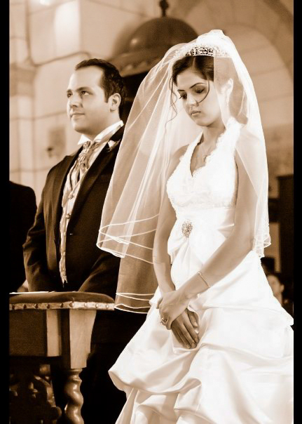 Sepia portrait of the couple during the ceremony