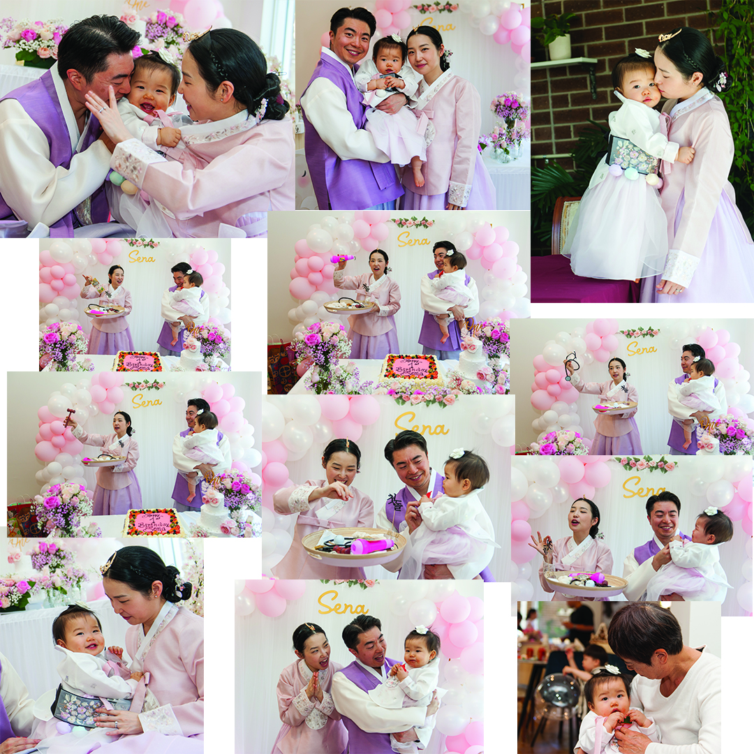Korean first birthday (doljanchi) celebration — parents in hanbok with balloons and cake